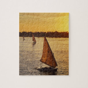 Drei Falukas mit Touristen auf dem Nil bei Puzzle