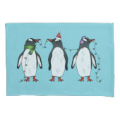 Drei festliche Weihnachtspenguinen auf hellblau Kissenbezug (Vorderseite-Links)