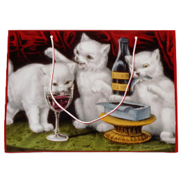 Drei glückliche Kätzchen am Fest Große Geschenktüte