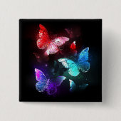 Drei glühende Schmetterlinge im Hintergrund Button (Vorderseite)