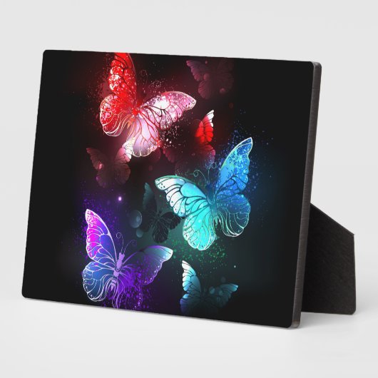 Drei glühende Schmetterlinge im Hintergrund Fotoplatte (Seite)