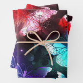 Drei glühende Schmetterlinge im Hintergrund Geschenkpapier Set (Beispiel)