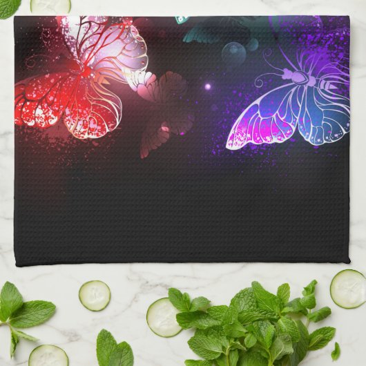 Drei glühende Schmetterlinge im Hintergrund Geschirrtuch (Gefaltet)