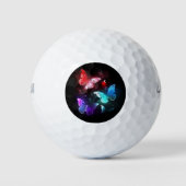 Drei glühende Schmetterlinge im Hintergrund Golfball (Vorderseite)