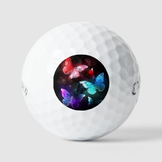 Drei glühende Schmetterlinge im Hintergrund Golfball (Vorderseite)
