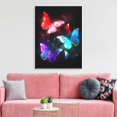 Drei glühende Schmetterlinge im Hintergrund Leinwanddruck (Insitu (Wohnzimmer))