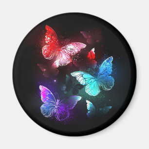 Drei glühende Schmetterlinge im Hintergrund Magnet
