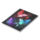 Drei glühende Schmetterlinge im Hintergrund Notizblock (Rotiert)