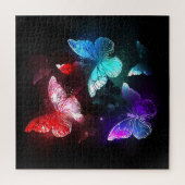 Drei glühende Schmetterlinge im Hintergrund Puzzle (Vertikal)