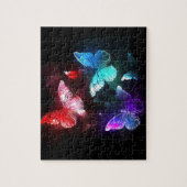 Drei glühende Schmetterlinge im Hintergrund Puzzle (Vertikal)