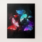 Drei glühende Schmetterlinge im Hintergrund Puzzle (Vertikal)