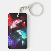 Drei glühende Schmetterlinge im Hintergrund Schlüsselanhänger (Rückseite)
