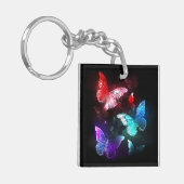 Drei glühende Schmetterlinge im Hintergrund Schlüsselanhänger (Vorderseite links)