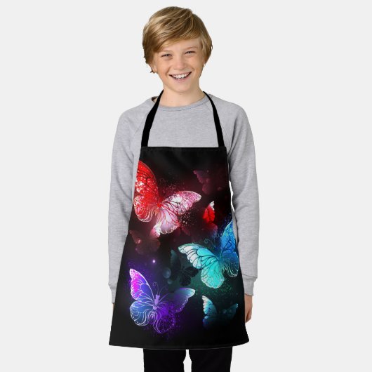 Drei glühende Schmetterlinge im Hintergrund Schürze (Getragen)
