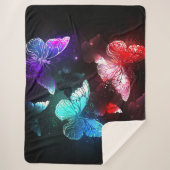 Drei glühende Schmetterlinge im Hintergrund Sherpadecke (Vorderseite)