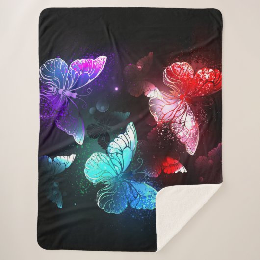Drei glühende Schmetterlinge im Hintergrund Sherpadecke (Vorderseite)