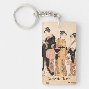 Drei junge Frauen, die als Komuso sich maskieren Schlüsselanhänger