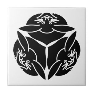 Drei Kaninchen Fliese