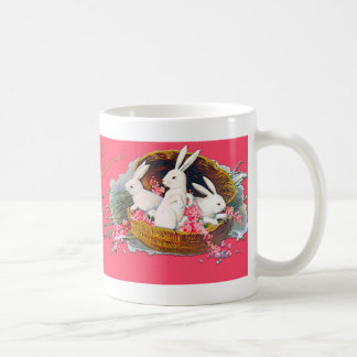 Drei Kaninchen in einer Basketttasse Kaffeetasse