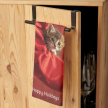 Drei Kätzchen in einer Weihnachtsstrumpf-Küche