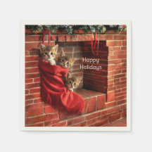 Drei Kätzchen in einer Weihnachtsstrumpf Serviette