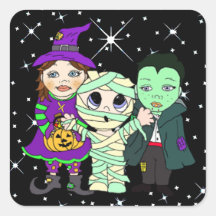 Drei Kinder zu Halloween