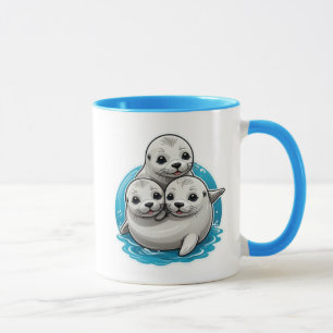 Drei liebenswerte Robbenbabys mit großen Augen. Tasse