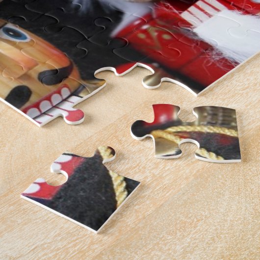 Drei Nussknacker auf dunklem Hintergrund Puzzle (Seite)