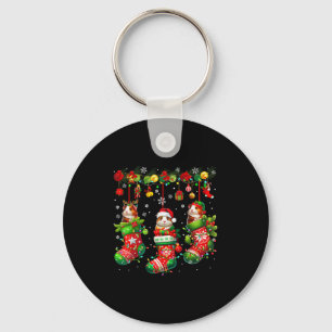 Drei Santa Reindeer Elf Guinea Gs in Weihnachtssoc Schlüsselanhänger