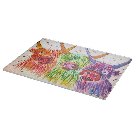 Drei schrullige bunte Hochlandkühe Schneidebrett (Ecke)