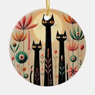 Drei schwarze Katzen inmitten eines lebendigen flo Keramik Ornament