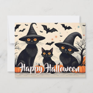 Drei schwarze Katzen mit Hüten an Halloween