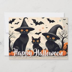 Drei schwarze Katzen zu Halloween