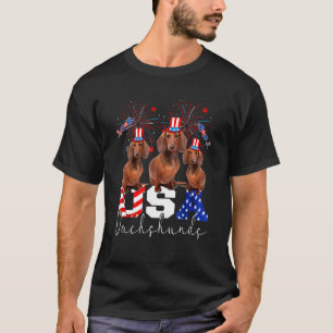 Drei US-Dackeln, die eine amerikanische Flagge tra T-Shirt