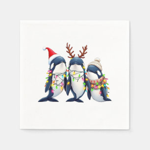 Drei Wale mit Weihnachtsfeiertag-Weihnachtsmannmüt Serviette