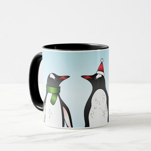 Drei weihnachtliche Gentoo Pinguine mit einem Indi Tasse (Vorderseite Links)