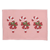 Drei Weihnachtskanäle auf hellrosa Kissenbezug (Vorderseite-Links)