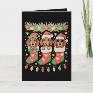 Drei Weihnachtsmann-Elf-Dachshunde-Weihnachts-Sock Feiertagskarte