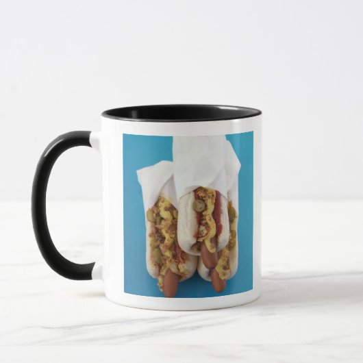 Drei Würstchen in den Brötchen Tasse (Links)