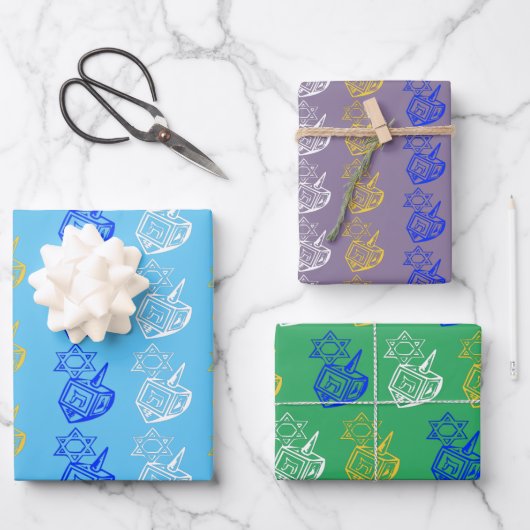 Dreidels + Sterne Geschenkpapier Set (Vorderseite)