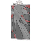 Dreieckige raue Ausschnitte über rotem Hintergrund Flachmann (Links)