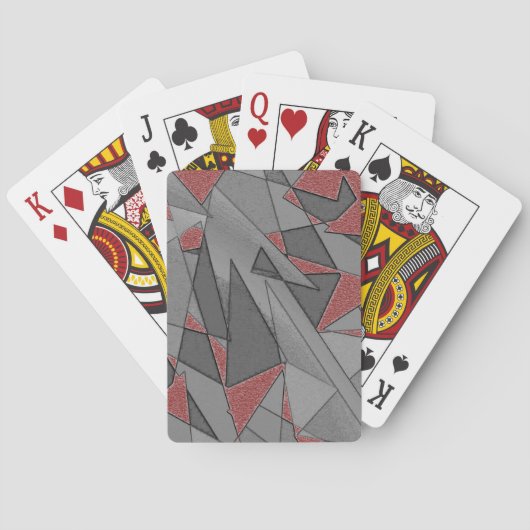 Dreieckige raue Ausschnitte über rotem Hintergrund Spielkarten (Rückseite)