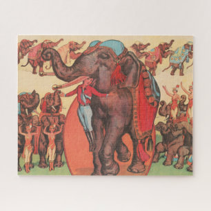 Dressierte Elefanten mit Frauen und Trainer. Puzzle