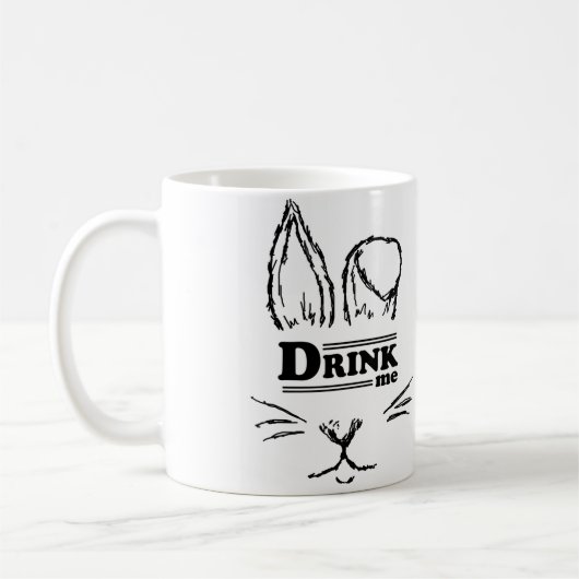 DrinkMe [gelehrte Stückchen] Tasse (Links)