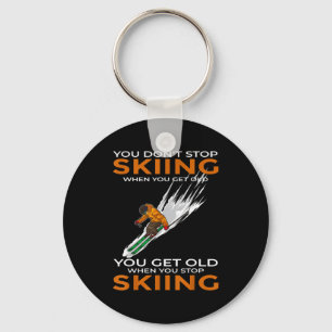 Du hörst nicht auf zu skifahren, wenn du alt wirst schlüsselanhänger