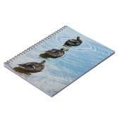 Ducks in einem Row-Notebook Notizblock (Linke Seite)