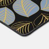 Dunkelblau und goldfarbene Blätter auf schwarz Schreibtischunterlage (Ecke)