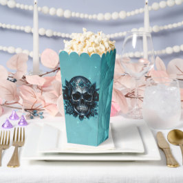 Dunkelblauer Schädel mit Rose. Geschenkschachtel