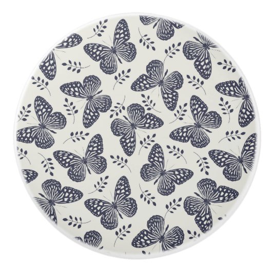 Dunkelblaues Schmetterlingsmuster auf grauem Hinte Keramikknauf (Vorderseite)