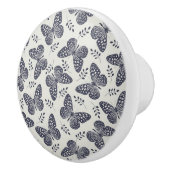 Dunkelblaues Schmetterlingsmuster auf grauem Hinte Keramikknauf (Rechts)